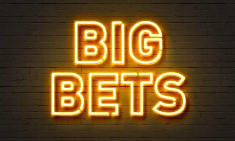Big bets neon sign on brick wall background - Back A Winner